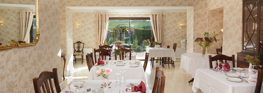 Glasha Farmhouse dining room prepared for breakfast