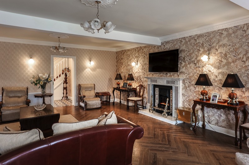 Large guest lounge with fireplace
